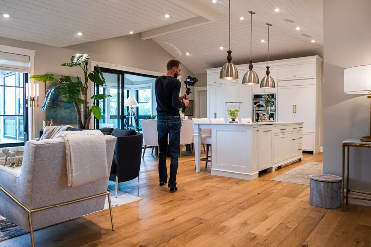 photographer taking pictures of a house