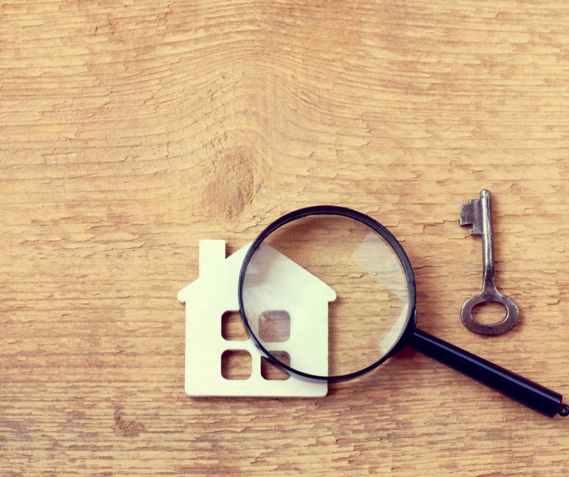 house, magnifying glass, and key