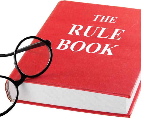 rule book with glasses